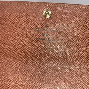281 Pre Owned Authentic Louis Vuitton Monogram International Long Wallet CA2040