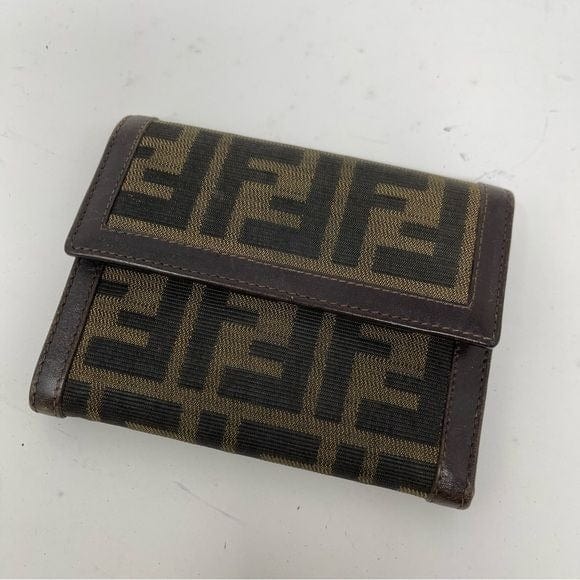 098 Pre Owned Authentic Fendi Zucca Leather Canvas Trifold Wallet 2270.30729.009