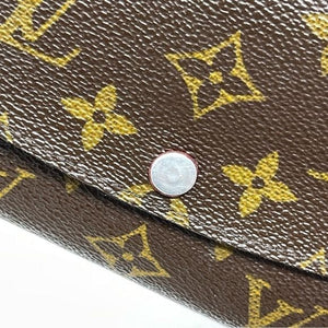 063 Pre Owned Authentic Louis Vuitton Monogram Emily Long Wallet CA5029