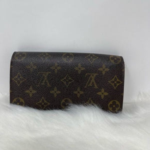0164 Pre Owned Authentic Louis Vuitton Monogram International Long Wallet MB0051